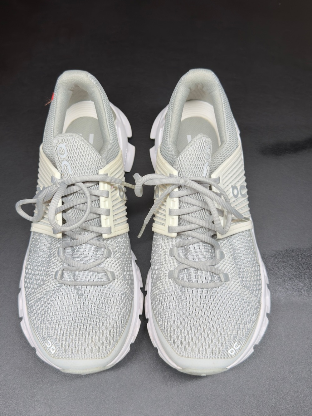 On Running Light Gray and White Mesh Trainers